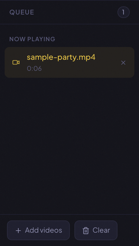 The queue panel with one item marked Now playing and Add videos and Clear buttons at the bottom.